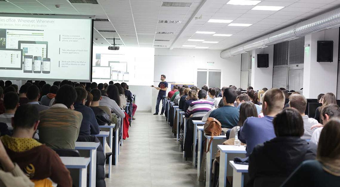 A lecturer and students during a programming class at the Software University.